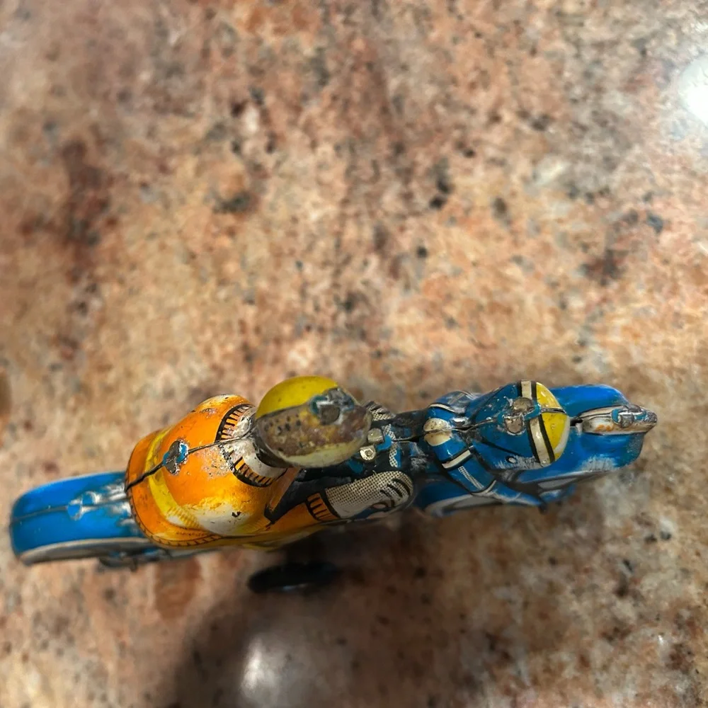 Tin Lithograph Friction Drive Ballon Cordatic toy cycle EN-12-63 Vtg 1950 Era.